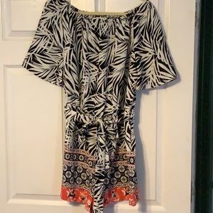 Sexy black, white and bright orange romper.